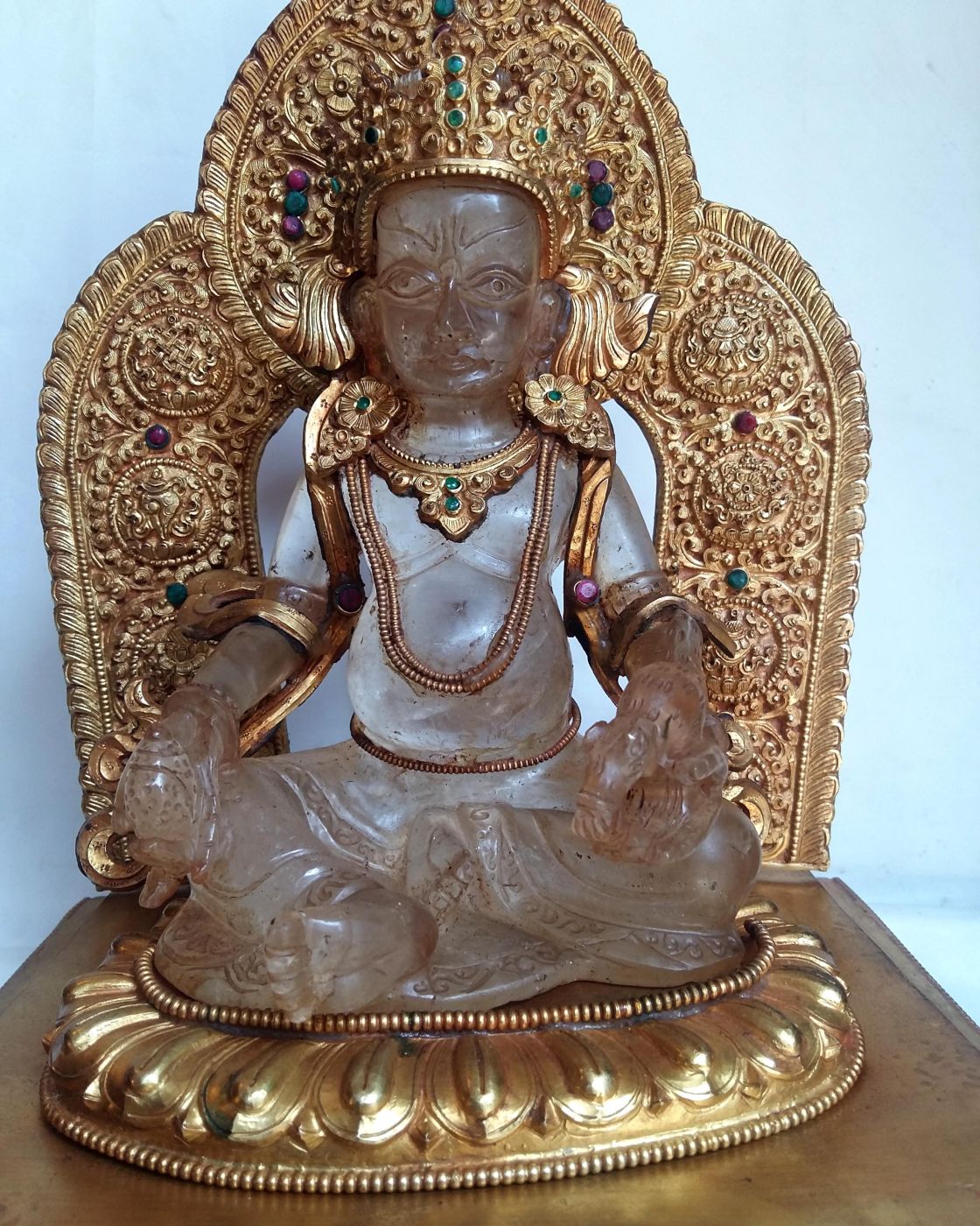 Crystal Yellow Jambhala With fire Gold Plated, Metal Background And Base