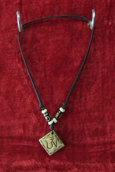 Om Design Bone Pendant