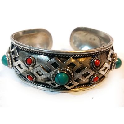 Endless Knot Metal Bracelet With Turquoise And Coral Stone Setting