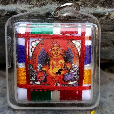 Yellow Jambhala - Small Tibetan Mantra Amulet With Hard Plastic Coat