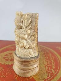 Buddhist Mahakala Carved In Yak Bone, On A Wooden Stand